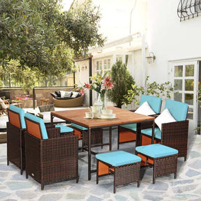 9 Pcs Rattan Wicker Outdoor Patio Dining Set with Acacia Wood Dining table, 4 Ottomans, 4 Cushioned Armchairs