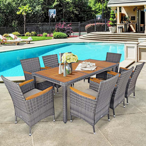 Canada Only - 9 Pcs Rattan Patio Dining Set with Acacia Wood Tabletop & Cushioned Armchairs
